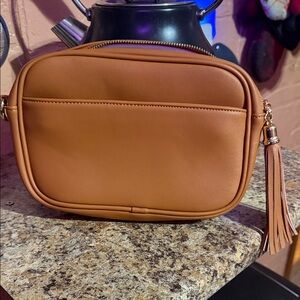 Chic Tan Crossbody Bag with Tassel